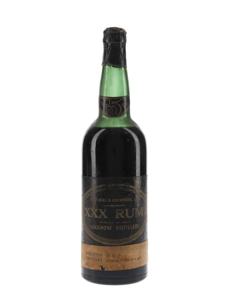 Dyer Meakin Breweries 5 Year Old XXX Rum Bottled 1950s - India 65.3cl / 42.8%