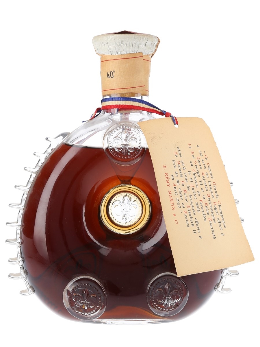 Sold at Auction: REMY MARTIN LOUIS XIII COGNAC BOTTLE w CURIO